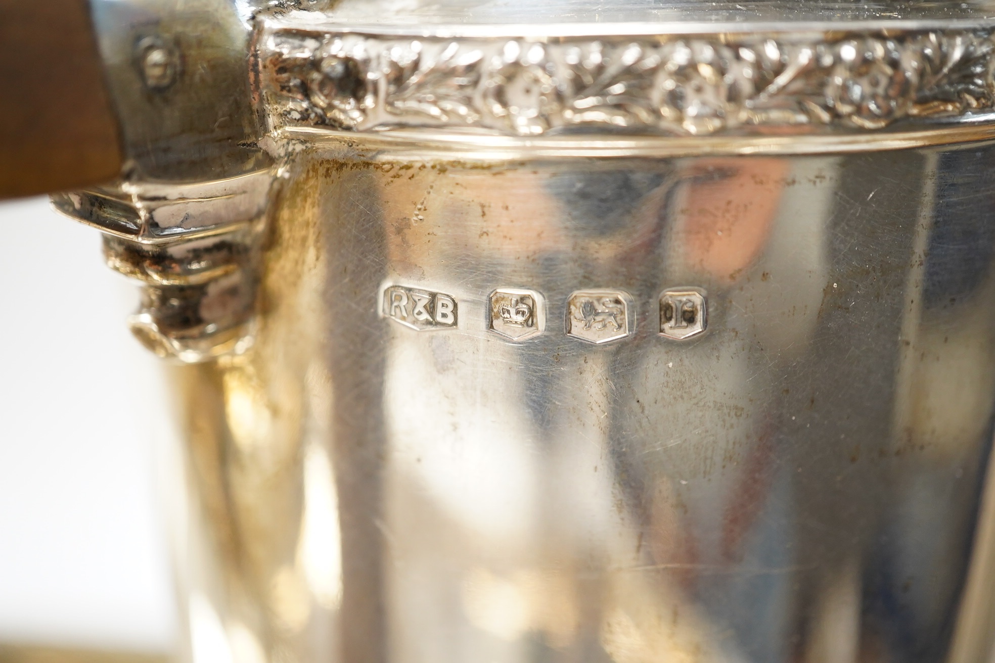 A George V silver five piece silver tea service including a two handled tea tray by Roberts & Belk, Sheffield, 1931/1934, tray 61.2cm over handles, gross weight 165.1oz. Condition - Fair to good